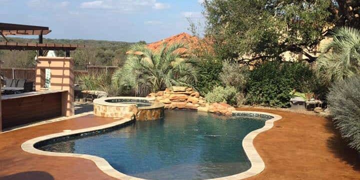 stained concrete pool surround